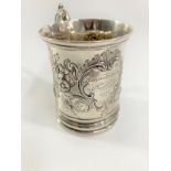 A Victorian Sterling Silver Mug. London 1847. Inscribed and chased with foliage. 8.5cm high. 120