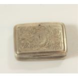 A George III Sterling Silver Vinaigrette. Circa 1790. Engraved with flowering foliage. Gilt interior