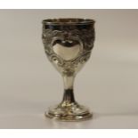 A George III Sterling Silver Goblet. Charles Hougham. London, 1788. Later chased with flowers and