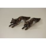A Pair of Silver Coloured Metal Cast Figures of Foxes. Apparently un marked. 9cm long. 132grams. 4.