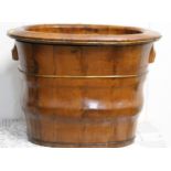A late 19th Century Chinese wooden baby bath having removable interior, and handles either side of