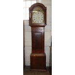 A Cornish long case clock. Mid 19th Century. Mahogany case. 8 day. Painted arch dial with 12" main