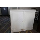 An Antique painted two Door Cupboard. 114cm x 126cm x 51cm.