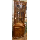 A Modern Yew Wood Veneered Corner Display Cabinet. With a single glazed door. 182cm x 65cm