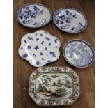 Four Large Oriental Platters, three decorated in blue and white, the fourth in a Chinese scene,