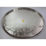 A Round Silver Plated Tray with Pierced Gallery and Decorated to Base