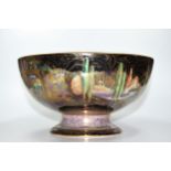A Wedgwood Fairy Land Lustre Bowl by Daisy Makeig Jones. Highly decorated to both inside and outside