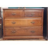 A Late Victorian Walnut Chest of drawers. Comprising two short and two long drawers. 81cm x 106cm