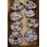 Eight Japanese Imari dishes 21cm to 31cm (8)