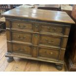 A Late 17th Century Chest. Of three long graduated drawers. With later handles. On bun feet. 81cm