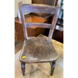 A Childs Oak and Elm Chair.