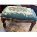 A Victorian Foot Stool. With tapestry top. Some damage to one leg.