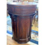 A Fine Victorian Mahogany Wash Stand. With a hinged lid above a cupboard door enclosing shelves.