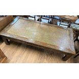 An Antique Far Eastern Low Table. Of large proportions. 54cm x 226cm x 118cm