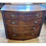 A 19th Century Mahogany Chest of Drawers. Of four long graduated drawers. On turned feet, which