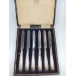 A cased set of fruit knives for six.