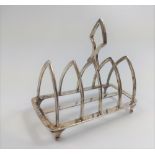 A silver toast rack.