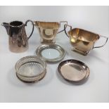 A collection of silver plate including tea sets, dishes, trays etc.