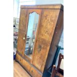 A Walnut Mirrored Wardrobe .Circa 1930