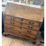 A George III Mahogany Bureau. Circa 1770. The fall front opening to reveal a fitted interior.