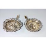 A pair of silver open salts & spoons. Birmingham 1898