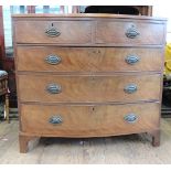 A George III Mahogany Bow Front Chest of Drawers. Fitted with two short and three long graduated