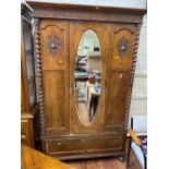 An Oak Mirrored Wardrobe. Early 20th century