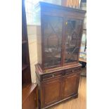 A Mahogany Display Cabinet. In Georgian Style. 20th century. 190cm x 90 x 38cm.