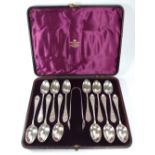 A boxed set of Edinburgh 12 teaspoons, and a pair of matching sugar nips Edinburgh 1886.