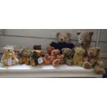 Thirteen soft toy Teddy Bears including Asqiuths and Hermann. (7)