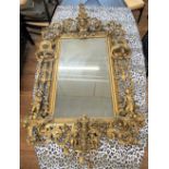 A Large and Impressive Carved Giltwood and Gesso Pier Glass. Possibly 18th century. Ornately