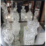 Four glass decanters including French and Bohemian and three Coalport drink labels. 20cm to 38 cm