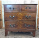 A George III Mahogany Chest of Drawers. Comprising two short and two long graduated drawers. On