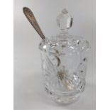 A Cut glass preserve jar with a silver spoon