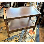 A tea trolley in mahogany veneer