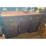 A George III Mahogany Serving or Sideboard. Circa 1800. The top with a splash back. Fitted with