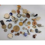 Two bags of collectables including spinning top, pin, wheel etc.