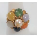 A 14k ring set with seven agates
