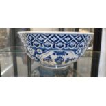 A Chinese blue and white bowl, late 19th century, 1880's. 20cm, some glue repair.