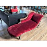 A Victorian Chaise Longue with red upholstery. Circa 1890.