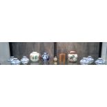 Two Chinese famille-verte ginger jars 12.5cm and 14cm, blue and white jar with lid 12cm, set of