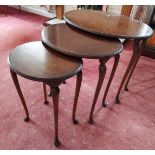 A Mahogany nest of tables. 20th century. of typical form.