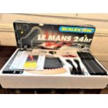 Scalextric set C1023 Le Mans 24hr with instructions and catalogue in original box.