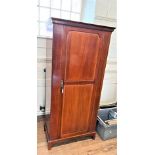 A Victorian Single door mahogany wardrobe.