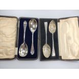 A pair of George III serving spoons for fruit c1812. Lightly gilded bowls in original fitted case,