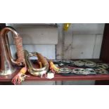 A brass Royal Welsh Fusiliers bugle (lacks mouthpiece), a copper and brass bugle and eleven horse