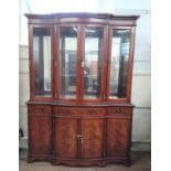 A Large Mahogany Display Cabinet. Modern. Fitted with a pair of glazed doors enclosing glass