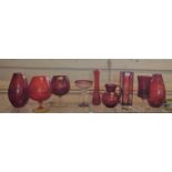 A selection of red glass vases including Jack in the Pulpit, 32cm, and jug, 18cm. (9)