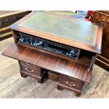 A Stereo Gramm. Late 20th century. In the form of a Georgian Style kneehole desk