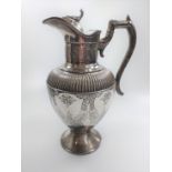 A Victorian Britannia metal water jug. circa 1890